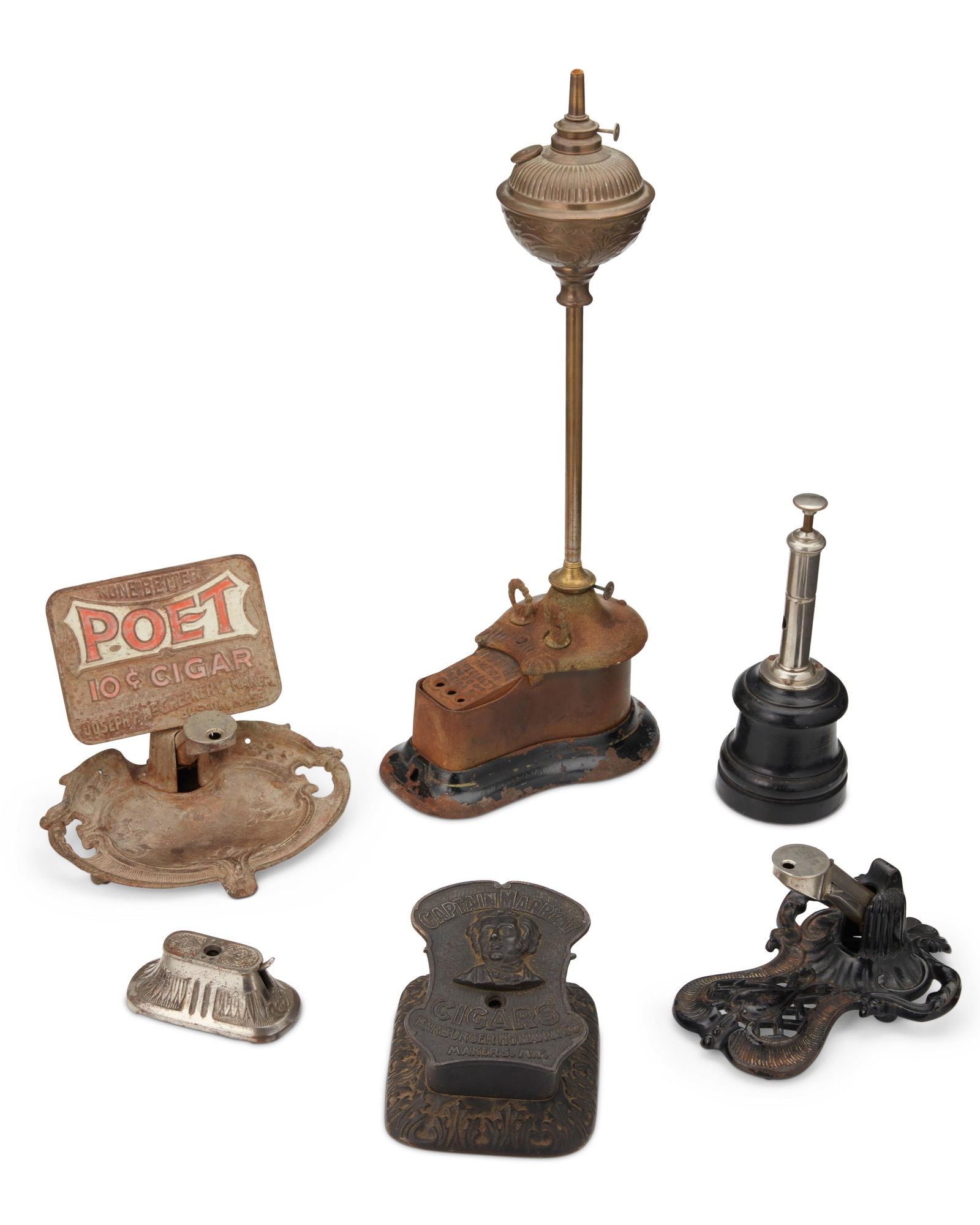 A group of tobacco paraphernalia: A group of tobacco paraphernaliaLate 19th/early 20th centuryOne marked: Poet / None Better / Joseph F. McGreenery, Maker / Boston, Mass.; another marked: Captain Marryat Cigars / Harburger Homan & Co.