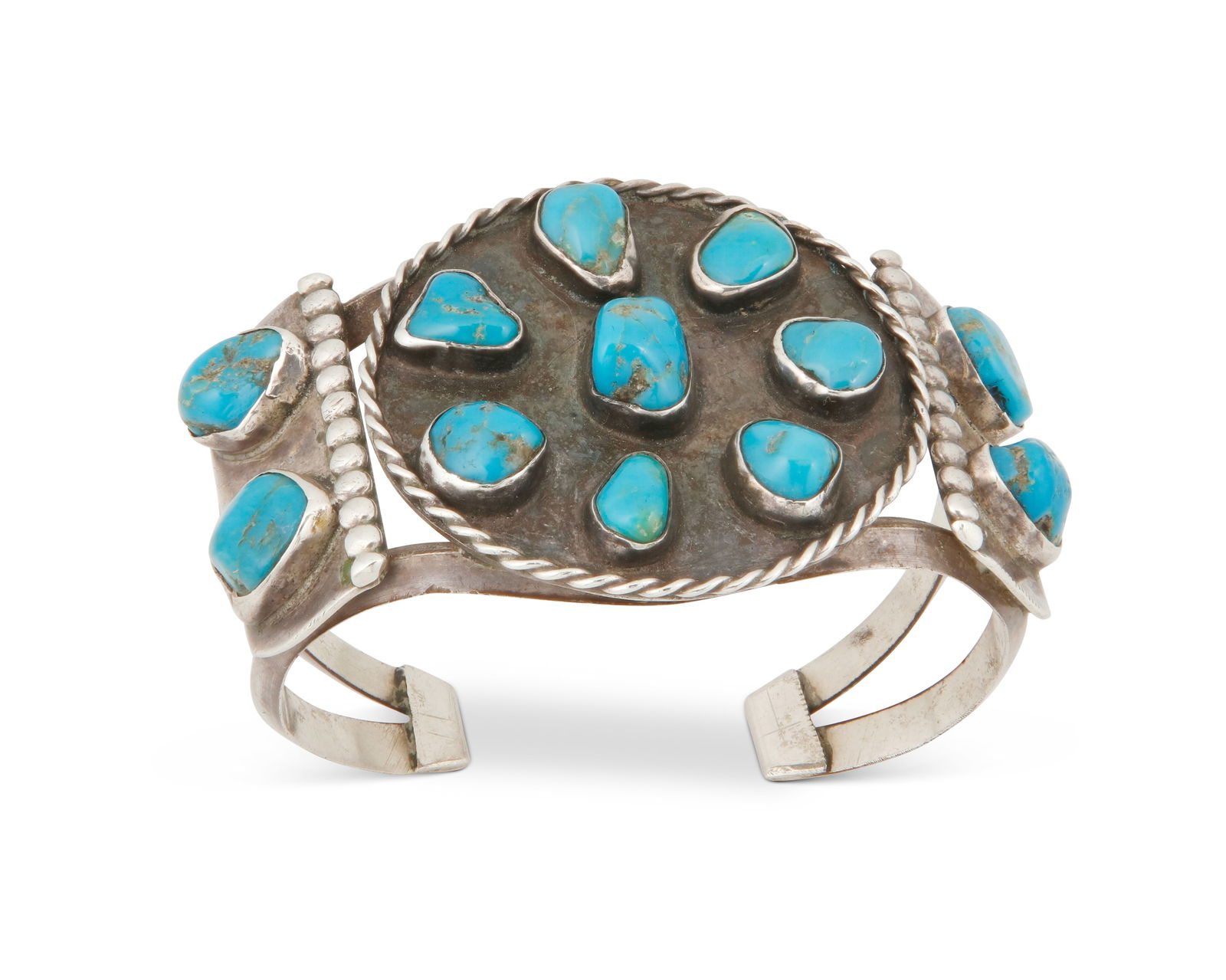 A Southwest silver and turquoise cuff bracelet (1 of 3)