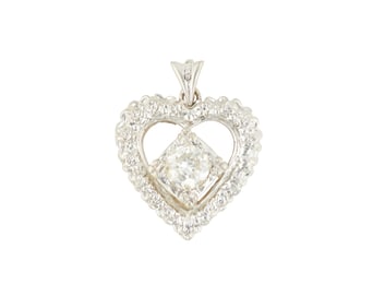 A 14K White Gold and Diamond Pendant