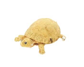 An 18K Gold, Sapphire and Diamond Brooch