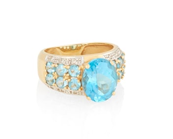 A 14K Gold, Blue Topaz and Diamond Ring