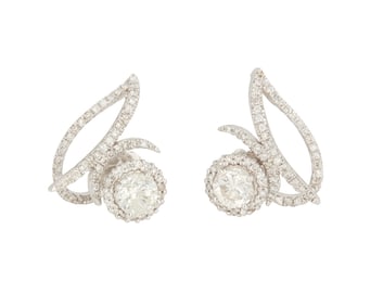 A Pair of 18K White Gold and Diamond Ear Studs and Jackets