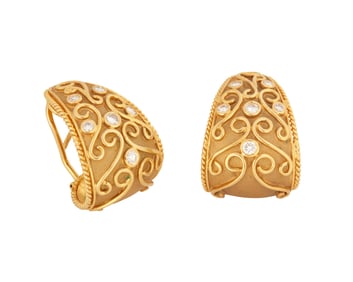 A Pair of Gold and Diamond Earrings