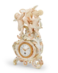 A Meissen porcelain figural mantel clock