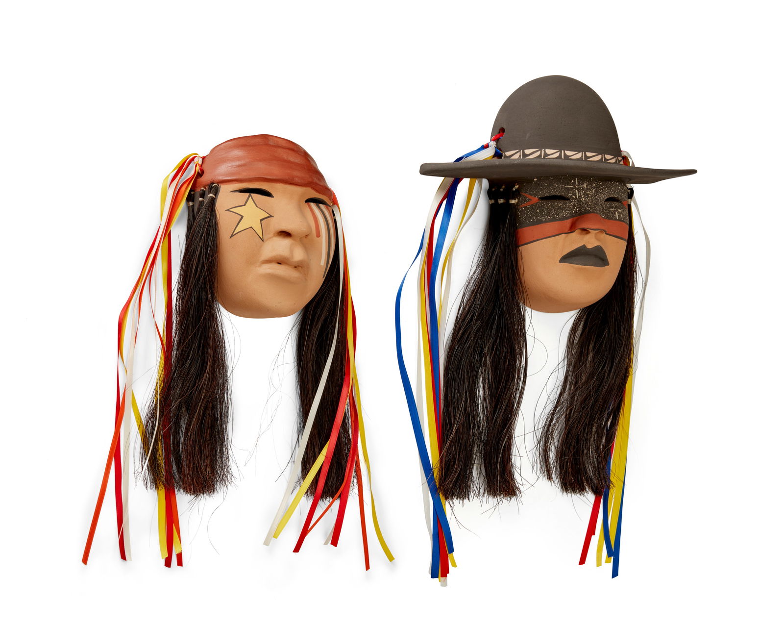 Fannie Loretto (b. 1951, Jemez/Isleta Pueblo), Two polychrome pottery masks, 21st century (1 of 5)