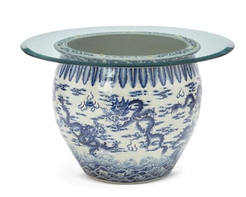 A blue and white porcelain fishbowl table