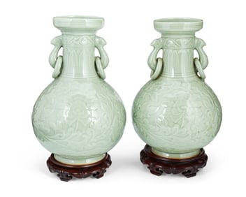 A pair of Chinese celadon handled vases