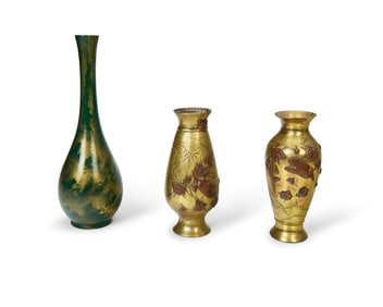 A group of diminutive East Asian metal vases