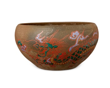 An earthenware dragon bowl