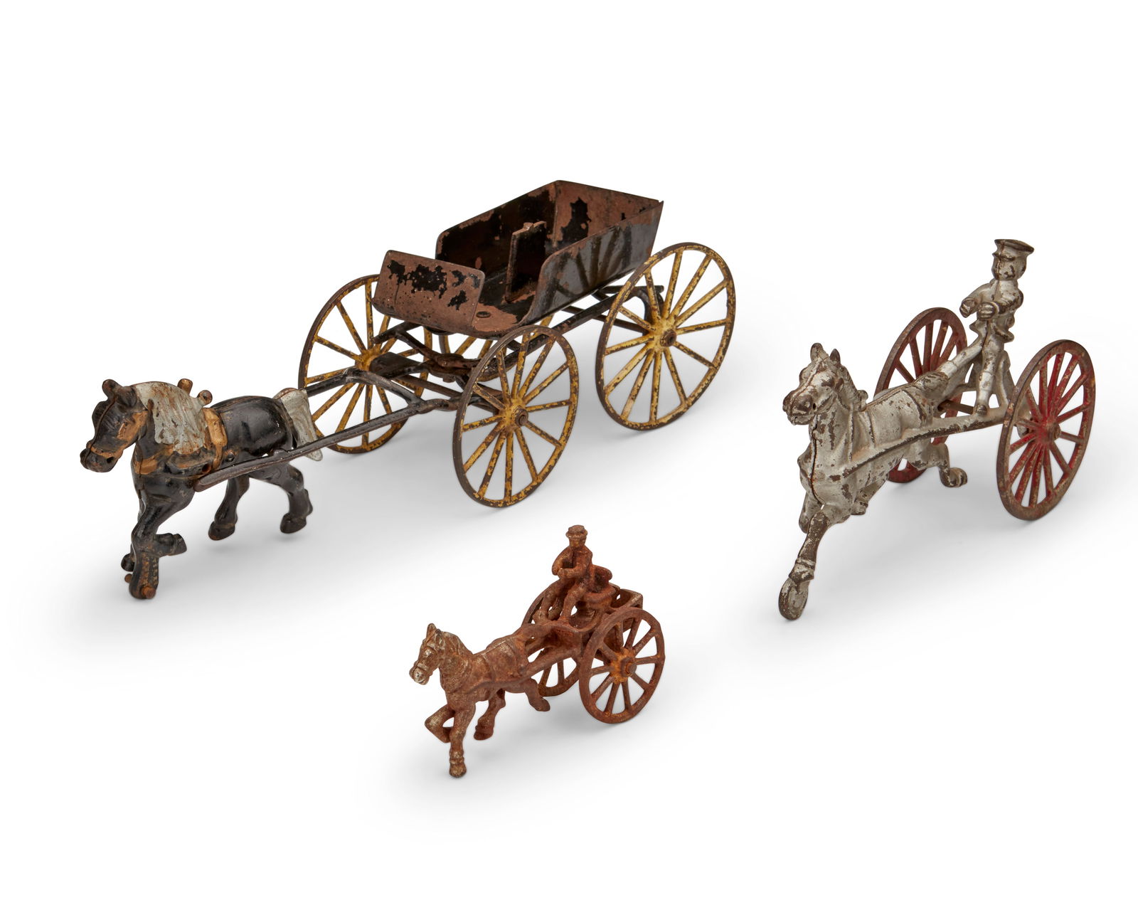 A group of cast iron trotter horse drawn carriage toys (1 of 10)