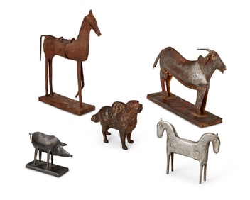 A group of metal toy animal items