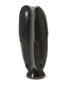 A Shona-style carved stone sculpture