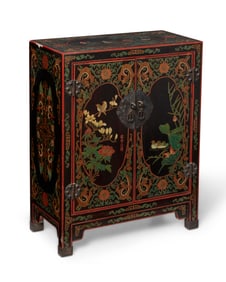 A chinoiserie diminutive lacquered cabinet