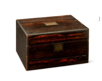 An inlaid wood jewelry box