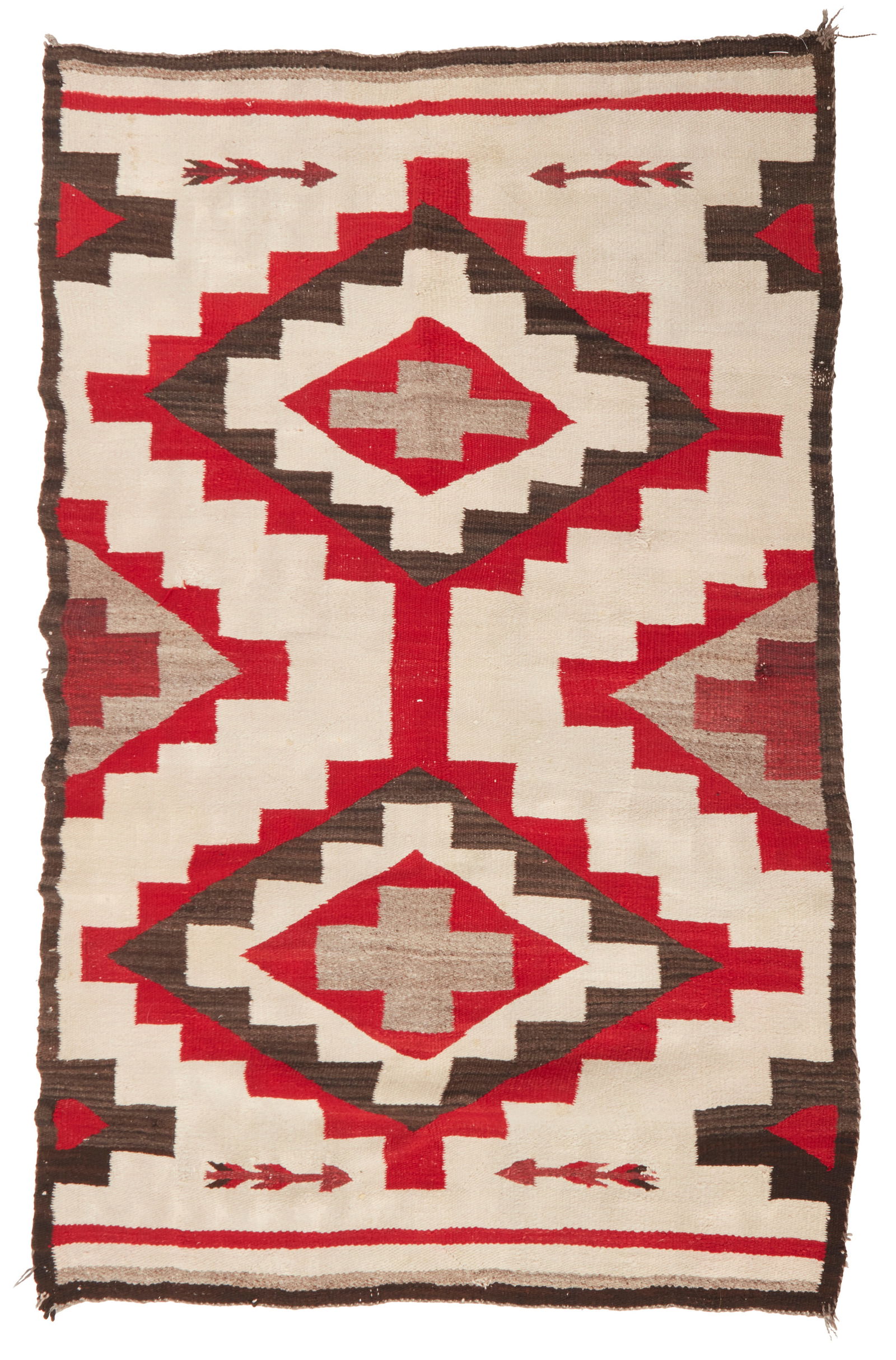 A Navajo regional rug: A Navajo regional rugEarly 20th century, DineWoven in red, cream, brown, light brown, and natural grey/brown wool with conjoined stepped diamonds at center and arrows at corners47.5" H x 67.5&quo
