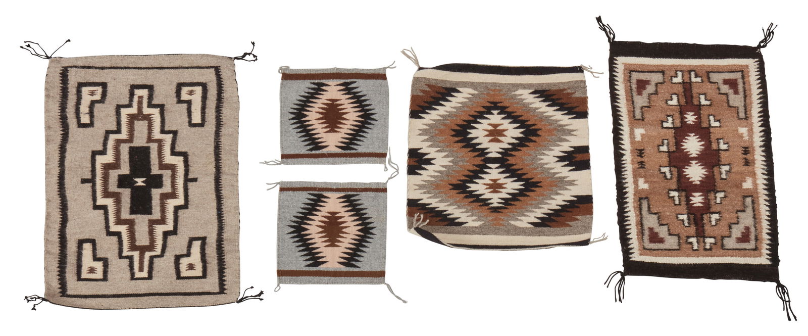 A group of Navajo Two Grey Hills matts and throws: A group of Navajo Two Grey Hills matts and throwsMid/late 20th century, DineOne with paper tag: Weaver: Marie P. Howard / of Fruitland (CPA); another with paper tag: Weaver: Dorene Yazzie (XEL)Each wo