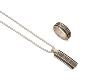A set of Tiffany & Co. "Atlas" sterling silver and titanium jewelry
