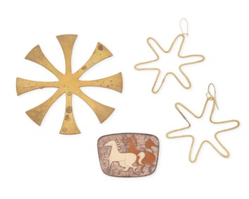 A group of mixed metal modernist jewelry