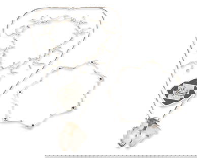 A group of modernist jewelry: A group of modernist jewelry Mid/late 20th century Three marked for maker and for sterling Four works comprising a large sterling silver and set onyx/black stone pendant with inset/intarsia
