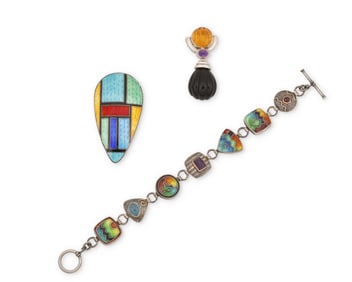 A group of set stone and enamel jewelry