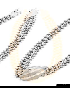 A Patrica von Musulin sterling silver necklace: A Patrica von Musulin sterling silver necklace Late 20th century Stamped: Von Musulin / Sterling A chunky three-strand sterling silver choker with swirled silver central plaque 16" L x