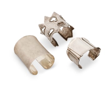 A group of sterling silver modernist cuff bracelets