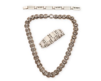A group of Hector Aguilar Mexican silver jewelry