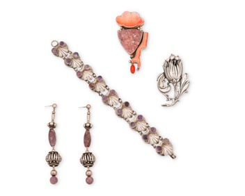 A group of silver and stone set jewelry