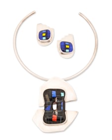 A mixed set of studio sterling silver and art glass jewelry