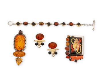 A group of sterling silver and amber jewelry