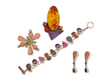 A group of sterling silver and set stone jewelry