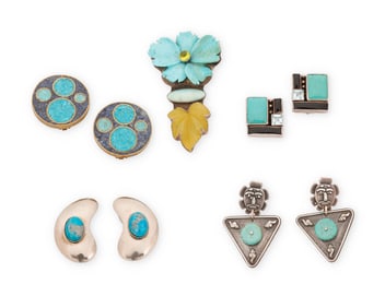 A group of silver and set stone jewelry