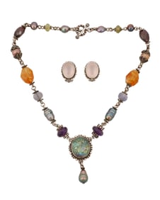 A mixed set of Stephen Dweck sterling silver and stone set jewelry