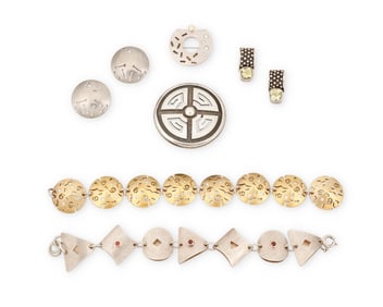 A group of silver jewelry
