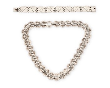 A group of Hector Aguilar Mexican silver jewelry