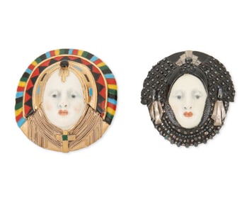 Two Roberta mask brooches