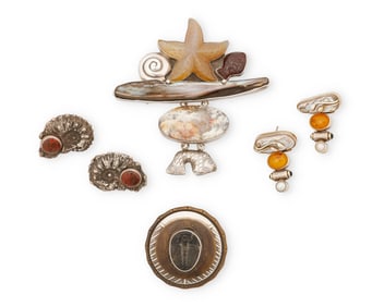 A group of silver and set stone jewelry