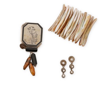 A group of silver and stone set jewelry