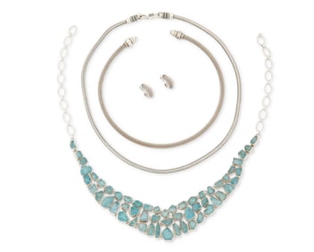 A group of silver jewelry