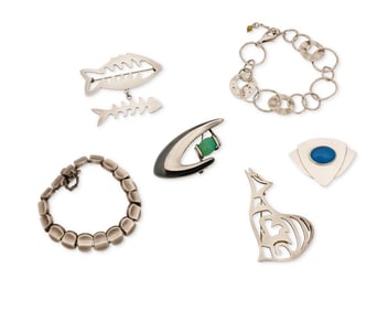 A group of modernist-style silver jewelry