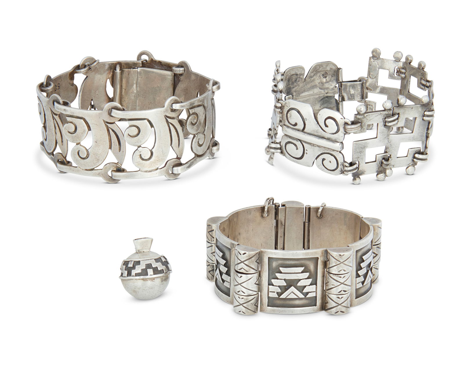 A group of Mexican silver link bracelets: A group of Mexican silver link braceletsFour works:Abraham Paz (b. 20th century)Mid-20th century; Mexico City, MexicoStamped: AP / Sterling / MexicoA sterling silver link bracelet with alternating inc