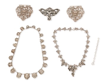 A group of vintage silver jewelry