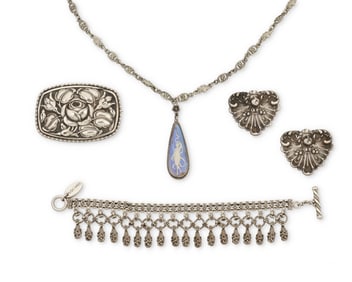 A group of vintage silver jewelry