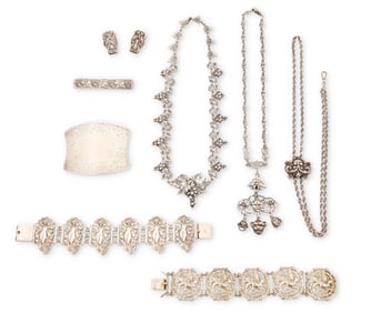 A group of vintage silver jewelry