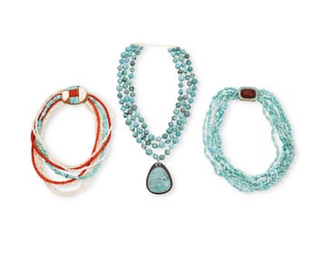 A group of gemstone bead necklaces