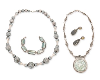 A group of studio jewelry