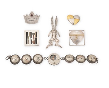 A group of silver jewelry