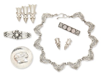 A group of silver jewelry