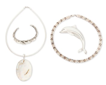 A group of sea-themed sterling silver jewelry