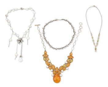 A group of set stone and pearl necklaces